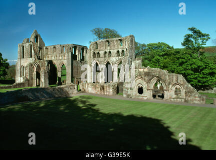 View ENE across cloister of Dundrennan Abbey, Kirkcudbright, to the C13th chapter house entrance (R) & S & N transepts of the C12th monastic church. Stock Photo