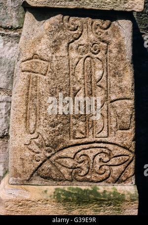 Abernethy, Perthshire, C7th Class I Pictish stone with incised symbols: a 'tuning fork', blacksmith's hammer, anvil, crescent & V-rod. Stock Photo