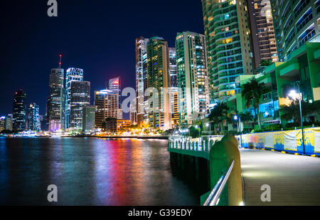 Walking down the boardwalk in Brisbane Australia looking across to the city. Beautiful colour water reflections. Stock Photo