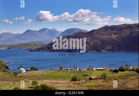 Salmon farming in Loch Torridon at Kenmore. Applecross Peninsula, Ross and Cromarty, Scotland. Stock Photo