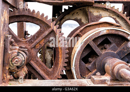 Old rusty gears for heavy industry as a machinery parts closeup Stock Photo