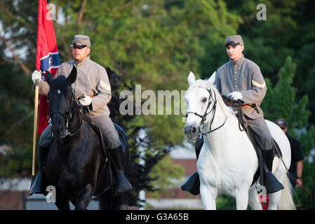 WASHINGTON DC, United States — The U.S. Army's Twilight Tattoo performance takes place on the grounds of Joint Base Myer-Henderson Hall in Arlington, Virginia. This free, public military pageant showcases the precision and discipline of the U.S. Army's ceremonial units, including the 3rd U.S. Infantry Regiment (The Old Guard) and The U.S. Army Band 'Pershing's Own.' Stock Photo