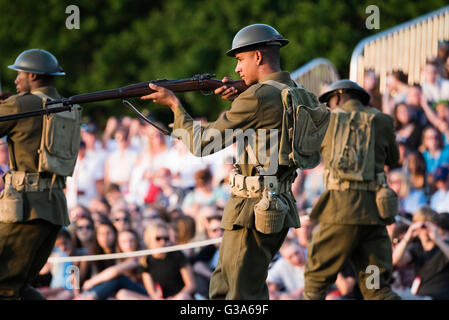 WASHINGTON DC, United States — The U.S. Army's Twilight Tattoo performance takes place on the grounds of Joint Base Myer-Henderson Hall in Arlington, Virginia. This free, public military pageant showcases the precision and discipline of the U.S. Army's ceremonial units, including the 3rd U.S. Infantry Regiment (The Old Guard) and The U.S. Army Band 'Pershing's Own.' Stock Photo