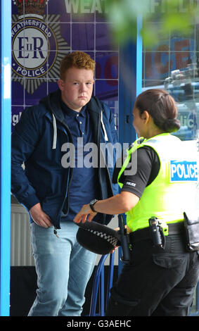 Coronation Streets Craig Tinker (played by Colson Smith) has lost his good boy tag as he has started drinking and getting drunk which has lead his to have a brush with the law. Craig's new drinking buddy Gemma Winter (played by Dolly-Rose Campbell) come the Weatherfield Police Station to help him talk his way out of his arrest. Stock Photo