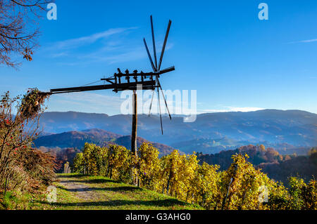 Traditional slovene scarecrow erected in vineyards in autumn Stock Photo