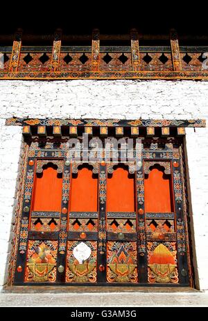 Local unique architectural details of wooden door in Bhutan. Stock Photo