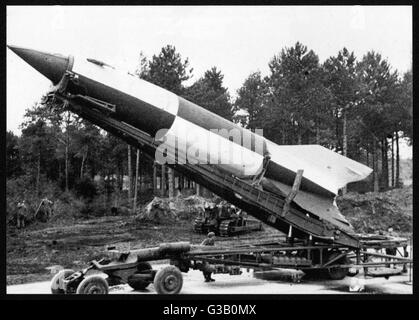A V2 rocket on the  launch pad.  More elaborate  than the V1, these were  first fired against London on  8 September 1944.      Date: Circa 1944 Stock Photo