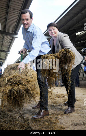 Chancellor of the Exchequer George Osborne during a visit to a farm near Galashiels in the Scottish Borders, with Scottish Conservative leader Ruth Davidson (right), to meet farmer Nigel Miller and his son Angus, to discuss the forthcoming European Union referendum. Stock Photo