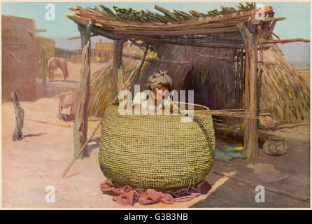 APACHE BASKETMAKER Stock Photo