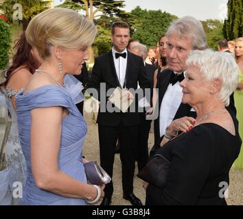 The Countessl of Wessex (left) talks with Dame Judi Dench and her partner David Mills, during a Gala Evening marking the 60th anniversary of The Duke of Edinburgh's Award, at Stoke Park, Stoke Poges, Buckinghamshire. Stock Photo