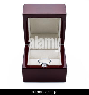 An engagement ring made of white gold with diamonds on a elegant box. Stock Photo