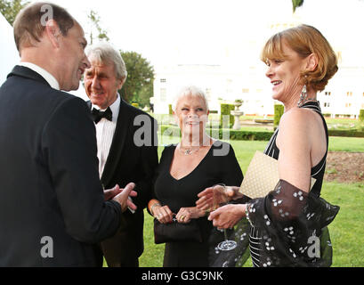 (L to R) The Earl of Wessex, David Mills, Dame Judi Dench and Samantha Bond attend the Duke of Edinburgh Award 60th Anniversary Diamonds are Forever Gala at Stoke Park, Stoke Poges, Buckinghamshire. Stock Photo