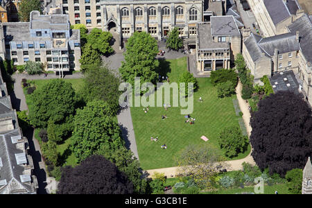 aerial view of students on the grass in a college quadrangle at Oxford University, UK Stock Photo