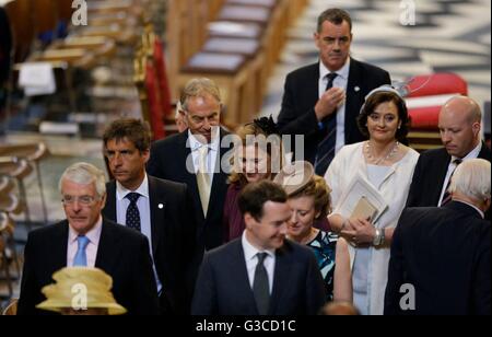 Former prime ministers Tony Blair, third left, and Sir John Major, left, leave with Sarah Brown, fourth left, the wife of former prime minister Gordon Brown and and Blair's wife Cherie, second right, leave after a national service of thanksgiving to celebrate the 90th birthday of Queen Elizabeth II at St Paul's Cathedral in London. Stock Photo