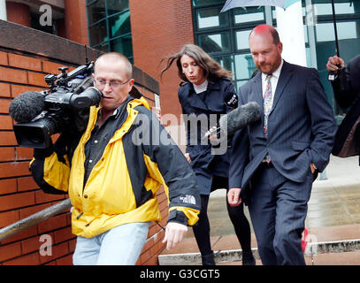 South Lakes Safari Zoo Director David Gill (right) leaves Preston Crown Court, as the zoo has been fined Â£255,000 after one of its employees was killed by a Sumatran tiger. Stock Photo