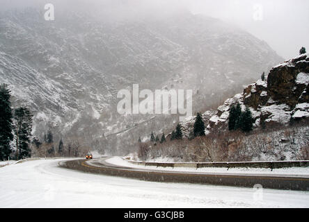 Lone car in snowstorm; Big Cottonwood Canyon; Wasatch Mountains; Utah; USA Stock Photo