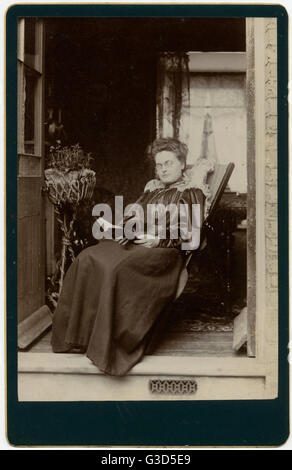 Woman reading a book Stock Photo