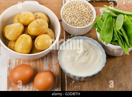 Vitamin K Rich Foods on wooden board. Healthy eating. Top view Stock Photo