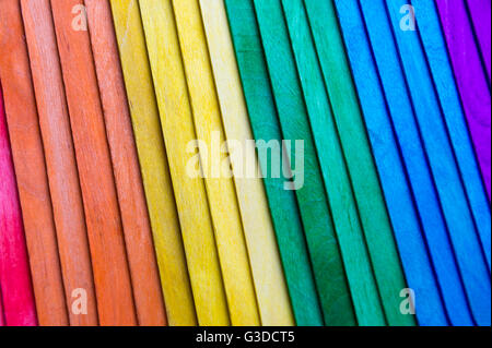 Abstract gay pride rainbow spectrum background on textured layered wood Stock Photo
