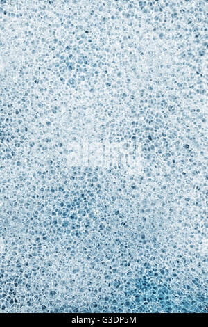 The texture of porous gray sponge closeup Stock Photo