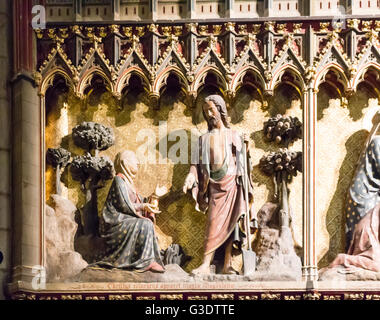 Wooden carving of Christ appearing to Saint Mary Magdalene. Cathedral of Notre Dame, Paris, France. Stock Photo