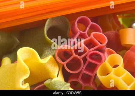 Italian colorful pasta in a funny shape photographed in studio on white background Stock Photo