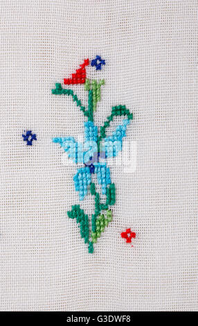 Hand embroidered flower Stock Photo