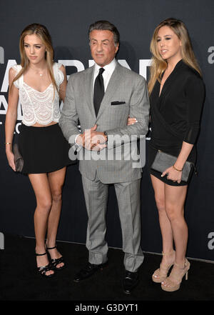 LOS ANGELES, CA - FEBRUARY 10, 2016: Actor Sylvester Stallone & model daughters Sistine & Sophia arriving at the Saint Laurent at the Palladium fashion show at the Hollywood Palladium. Stock Photo