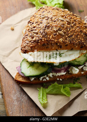 breakfast sandwich with egg, food close-up Stock Photo