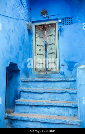 Classic door, stairs and wall in Blue City Jodhpur, India. Stock Photo