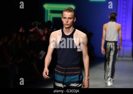 Models on the catwalk during the Tiger of Sweden London Collections Men SS17 show held at the Topshop Show Space Ambika P3 in London. Stock Photo