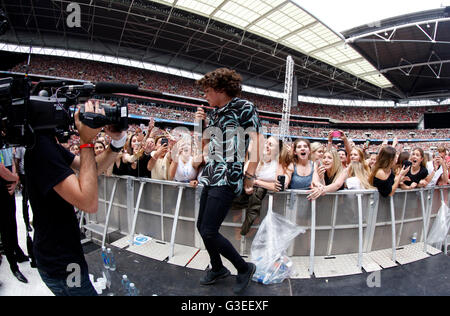 Bradley Simpson of The Vamps performing at Capital FM's Summertime Ball with Vodafone held at Wembley Stadium, London. Stock Photo