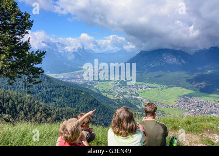 view of Burgrain and Garmisch-Partenkirchen, hikers, Germany, Bayern, Bavaria, Oberbayern, Estergebirge, Upper Bavaria, Farchant Stock Photo