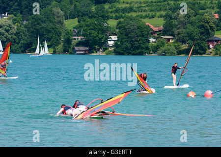 Sailboats and windsurfers pupils in lake Mattsee, Austria, Salzburg, Flachgau, Mattsee Stock Photo