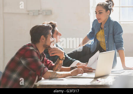 Creative young business people working in office Stock Photo