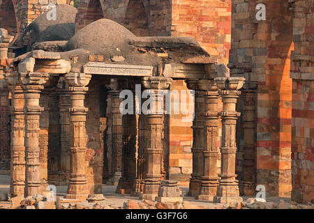 Old sandstone pillars at the Qutb Minar complex in Delhi, India Stock Photo