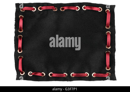 Frame made of black silk with inserted red satin ribbon, isolated on white background Stock Photo
