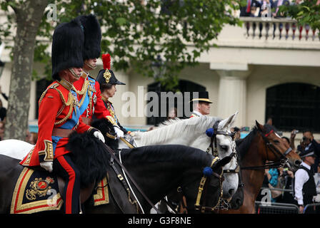 The Prince of Wales, the Duke of Cambridge and the Princess Royal as the royal procession makes its way down The Mall from Buckingham Palace, central London to Horse Guards Parade for the Trooping the Colour ceremony as the Queen celebrates her official birthday today. Stock Photo