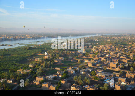 Hot air ballooning over the world's largest open air museum at Luxor, Egypt. Stock Photo