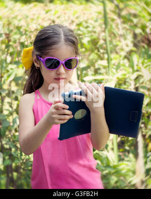 Girl using tablet Stock Photo