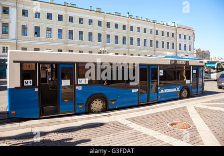 City bus as a mobile public toilet parked at the city street in summer day Stock Photo