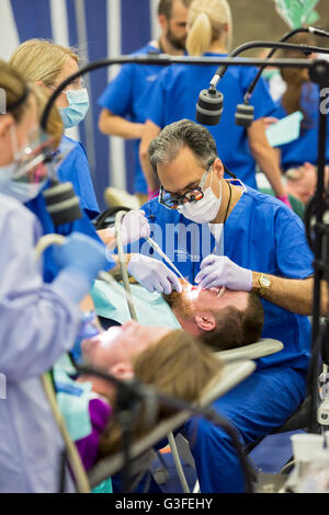 Warren, Michigan, USA. 10th June, 2016. Several thousand people received free dental care from volunteer dental professionals at a two-day clinic organized by the nonprofit Mission of Mercy. Credit:  Jim West/Alamy Live News Stock Photo
