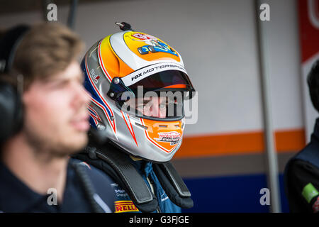 Northamptonshire, UK. 11th June, 2016.  Paul McNeilly waiting to go out in his #48 Fox Motorsport Ginetta G55 GT4 Credit:  steven roe/Alamy Live News Stock Photo