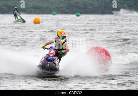 Crosby Park Marina, Merseyside, UK. 11th June, 2016. JSRA British Junior Championship 11-Jun-2016.  11 year old Lucy Gadsby from Tarleton in Lancashire, jet ski racing in the JSRA Championship on Crosby Park Marina nr Liverpool.  Sport sensation Lucy, who only started jet ski racing a year ago, is currently leading the junior championship.  At only 11yrs old, her future in jet sports looks very promising. Credit:  Cernan Elias/Alamy Live News Stock Photo