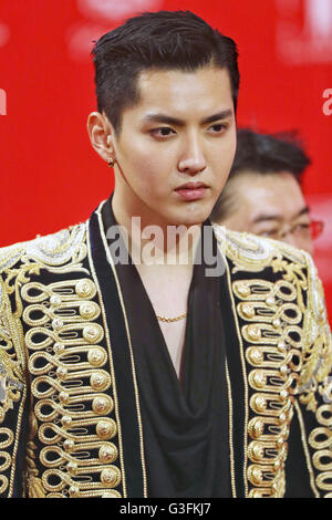 Chinese actor Kris Wu poses at a promotional conference for his