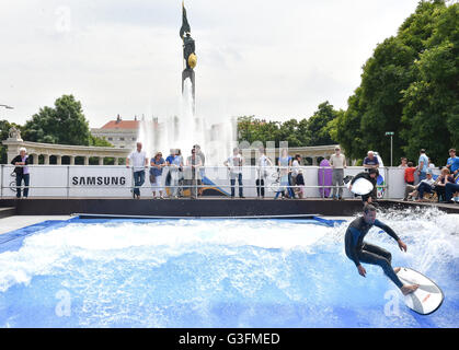 Vienna, Austria. 11th June, 2016. A man surfs in a wave pool built in Vienna, Austria, June 11, 2016. The wave pool in Vienna opens from 10 A.M. to 10 P.M. until this September. Credit:  Qian Yi/Xinhua/Alamy Live News Stock Photo