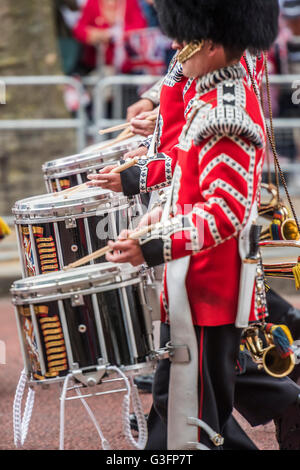 London, UK. 11th June, 2016. Guardsmen and their bands march down the Mall - Queens 90th birthday was celebrated by the traditional Trooping the Colour as well as a flotilla on the river Thames. Credit:  Guy Bell/Alamy Live News Stock Photo