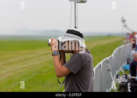 Biggin Hill, UK. 11th June 2016. A photographer at the Biggin Hill Festival of Fligh Credit: Keith Larby/Alamy Live News Stock Photo