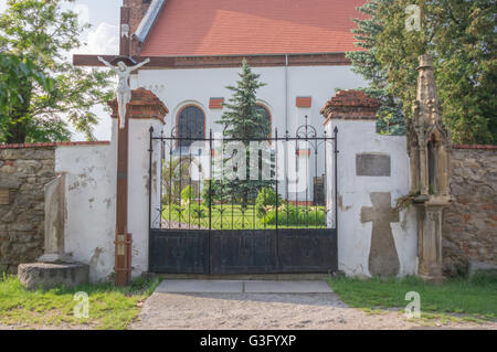 Front gate in the wall village church in Smialowice Schmellwitz Lower Silesia Poland Stock Photo