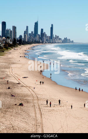 Gold Coast Skyline With People Walking On Beach, Gold Coast, Queensland ...